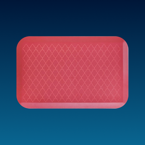 Red doormat with a geometric pattern on a blue background