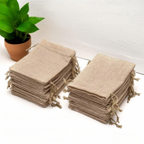 Brown jute linen drawstring pouches in multiple sizes for gifting and storage