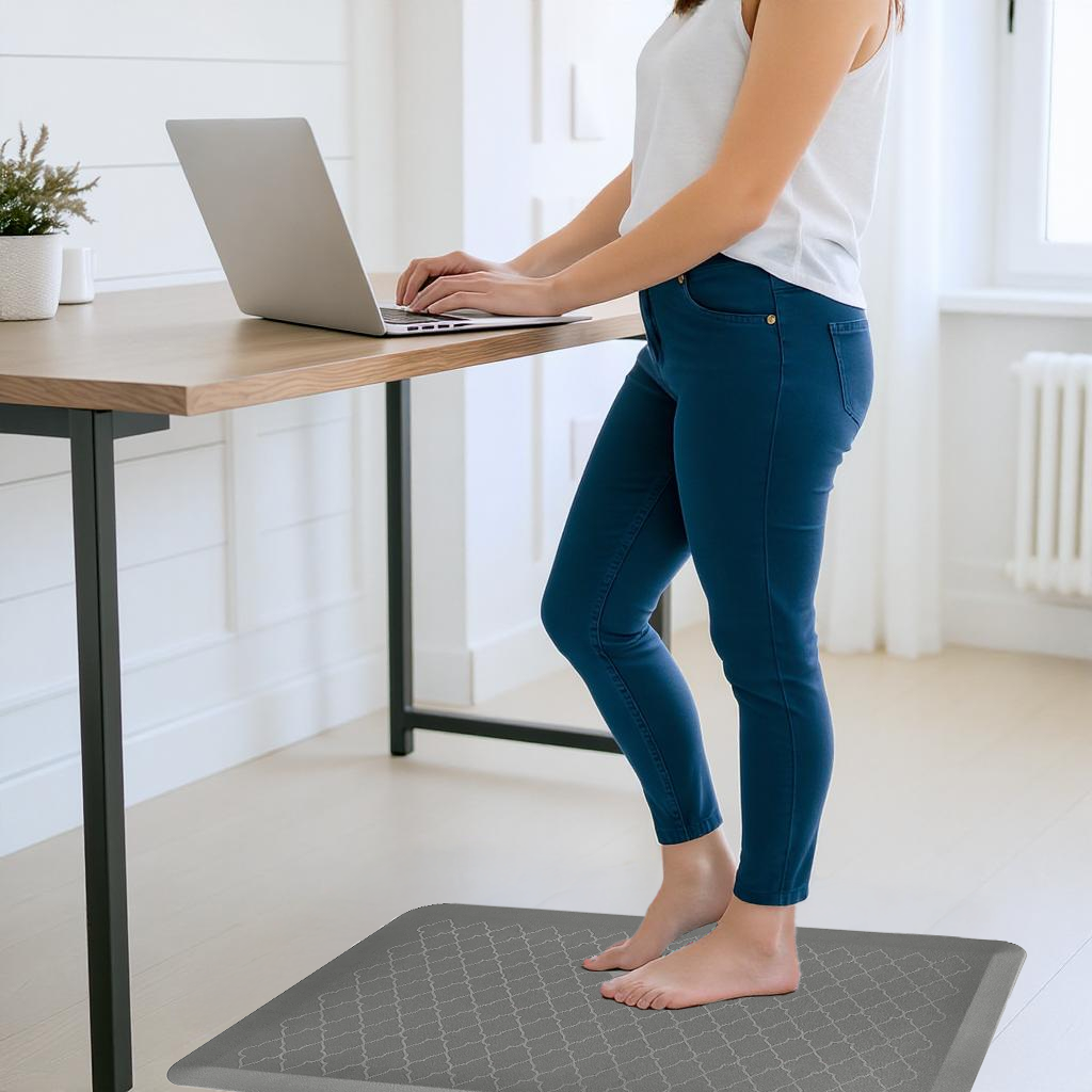Grey anti-fatigue standing desk mat for cushioned support while working