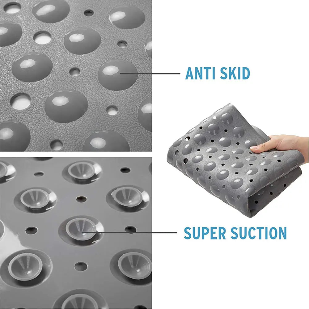 Grey soft pebble bath mat close-up showing anti-slip surface drainage holes and suction cups
