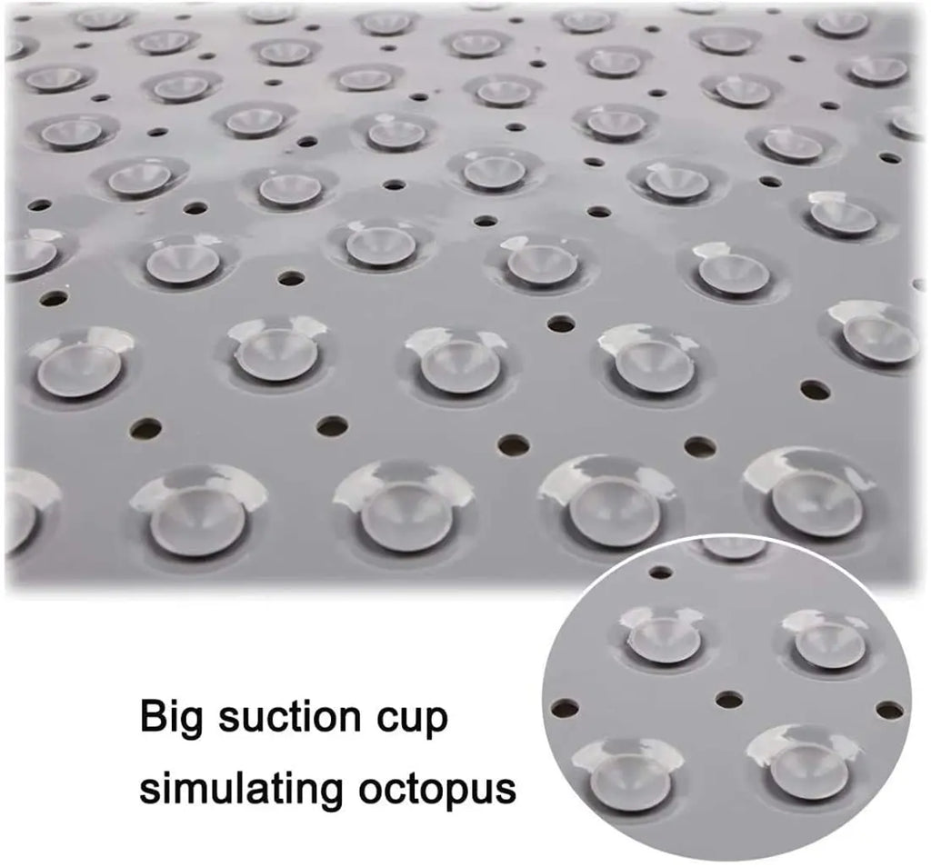 Underside of grey anti-slip bath mat showing suction cups and drainage holes