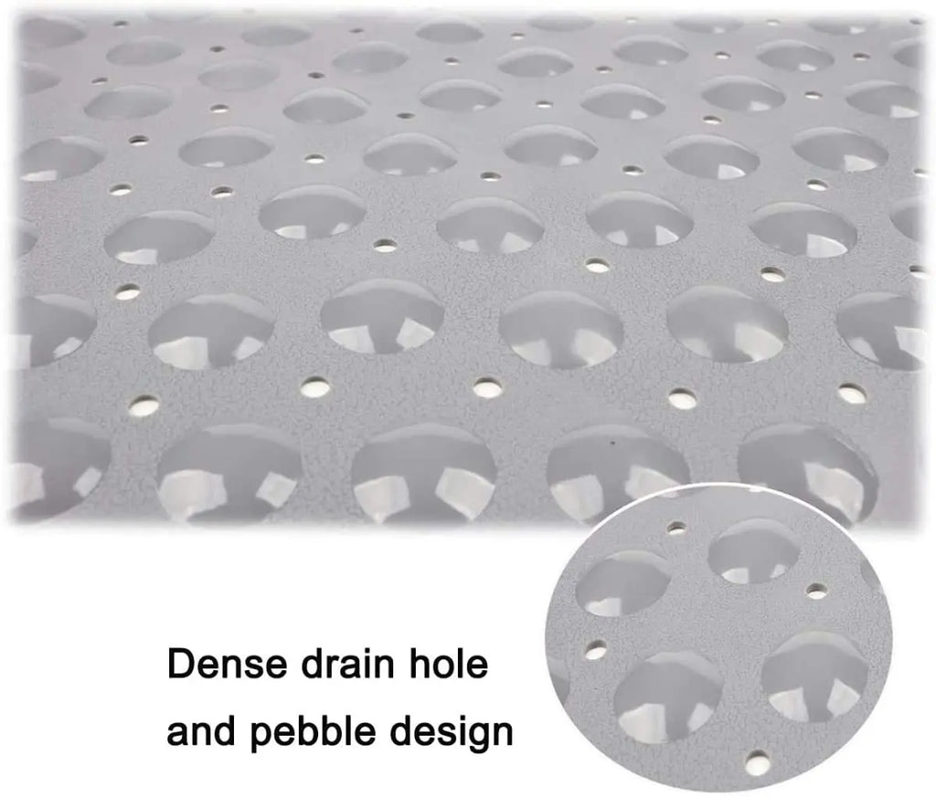Grey shower bath mat with dense drainage holes and soft pebble textured design