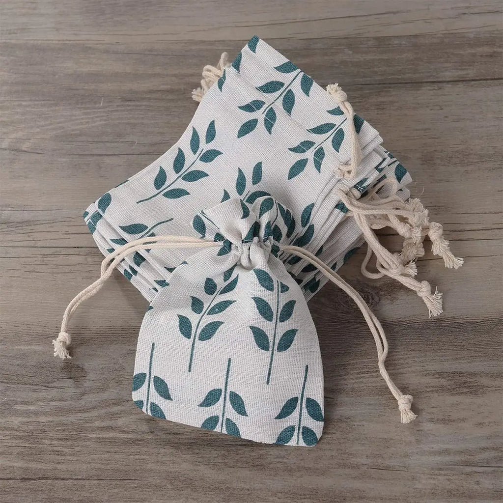 Leaf design jute drawstring pouches for bulk return gifts, weddings and events