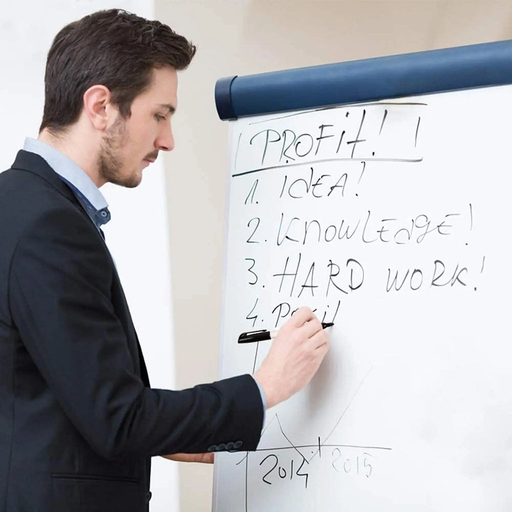 Dry erase marker pen used for writing presentation notes on office flip chart