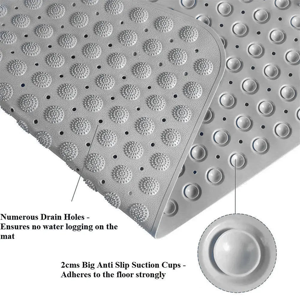 Grey Accu Pebble bath mat showing drainage holes and anti-slip suction cups underneath