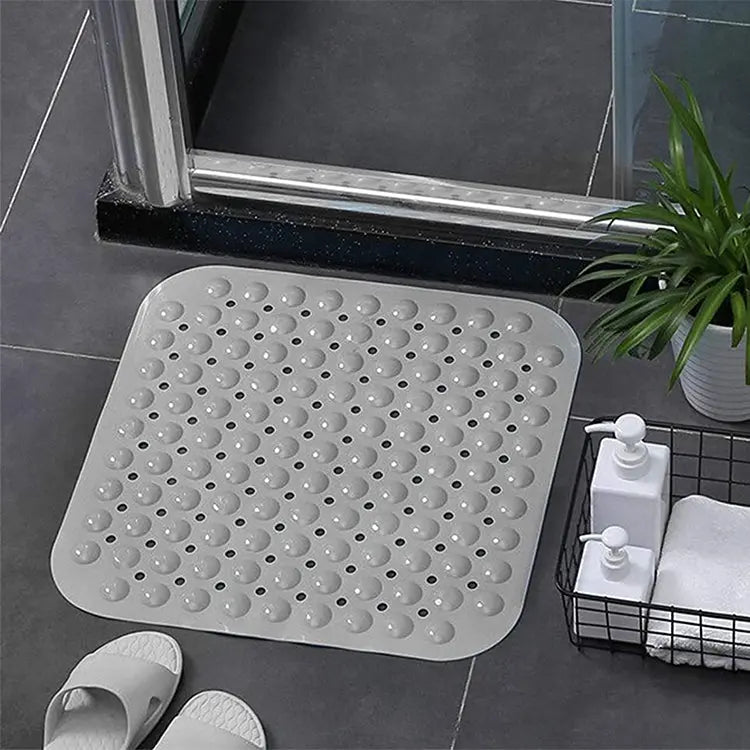 LifeKrafts grey soft pebble anti-slip bath mat on tiled floor beside shower area