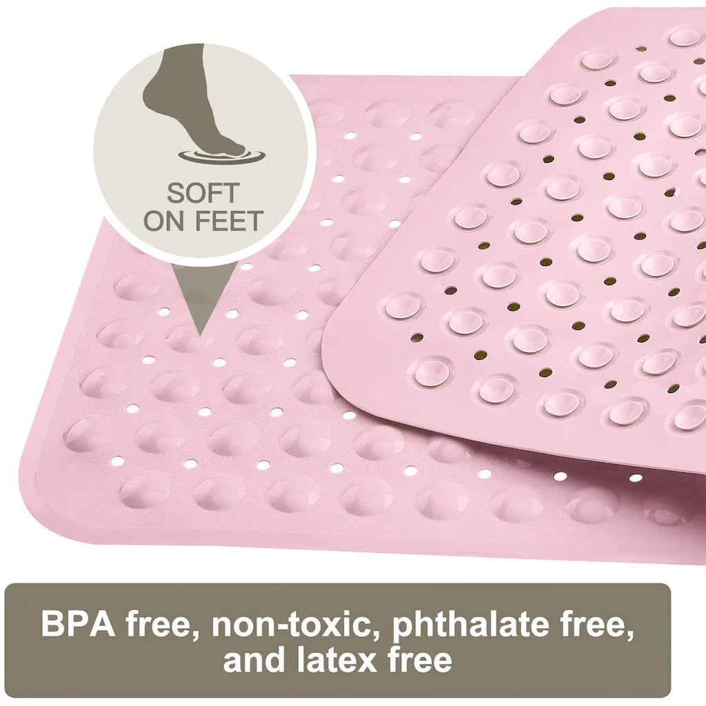 Suction cups and drainage holes on pink anti-slip bath mat for secure floor grip