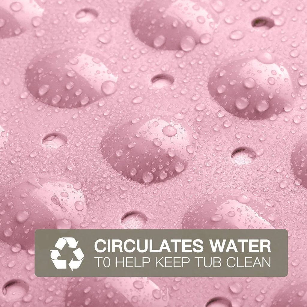 Soft pebble surface of pink anti-slip bath mat for comfortable bathroom use