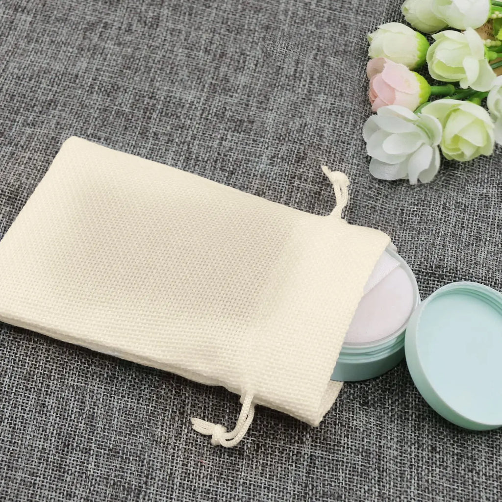 Cream jute linen pouch for storing cosmetics, jewellery and small personal items