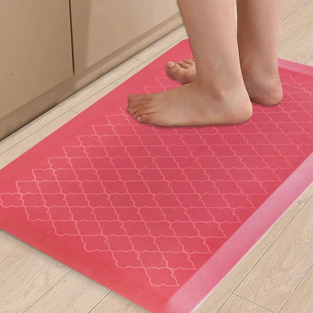 Red patterned anti-fatigue floor mat with cushioned standing surface for everyday indoor use