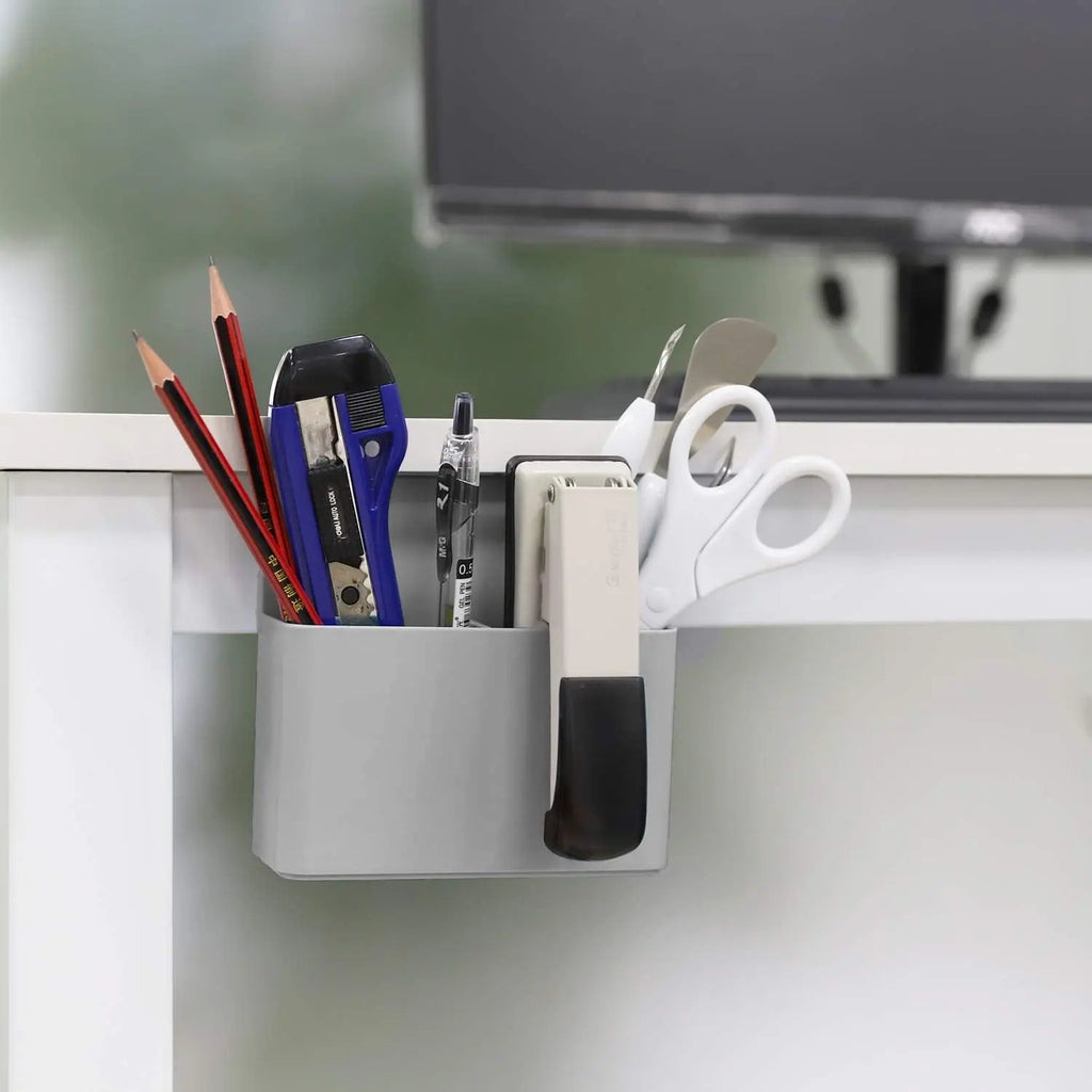 Grey magnetic organizer holding pencils markers scissors and office supplies