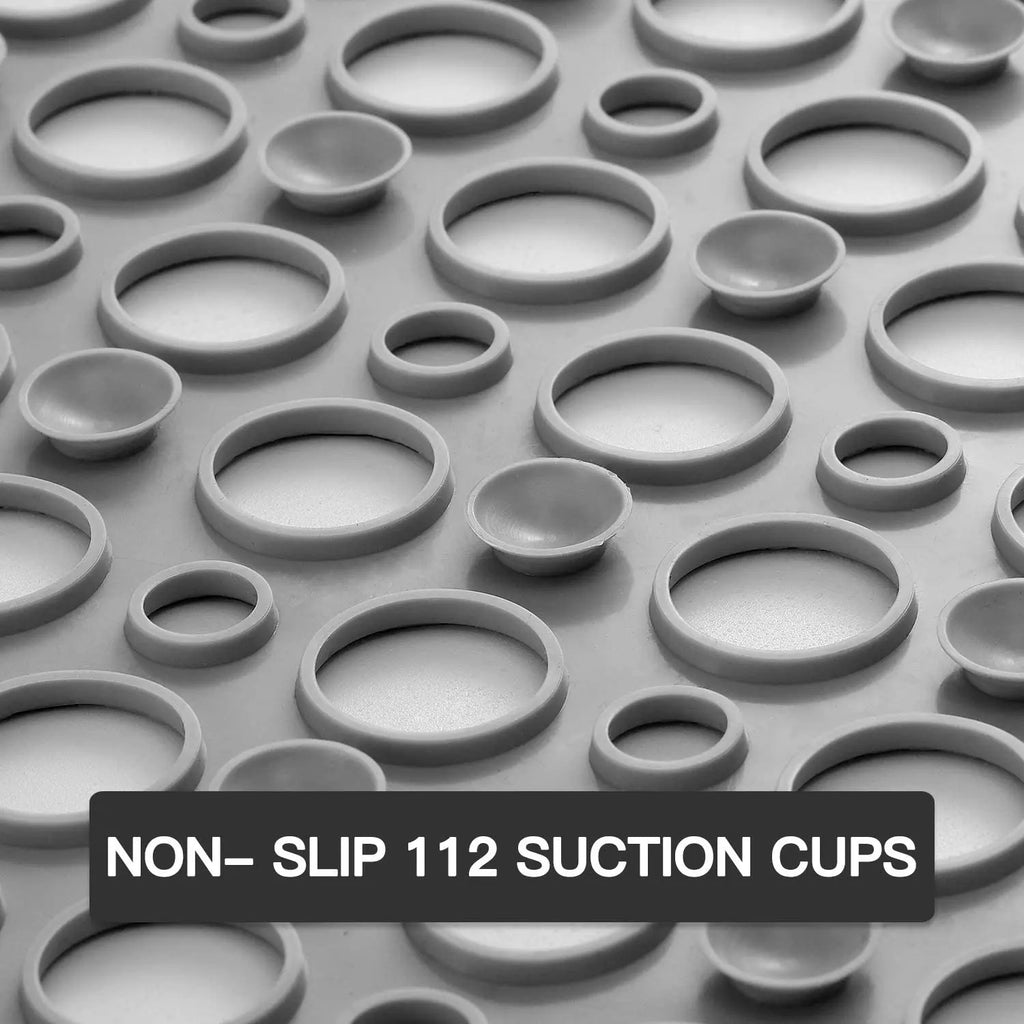 Grey non-slip shower bath mat underside showing suction cup grip