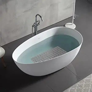 Grey non-slip hole bath mat placed inside a bathtub for shower and bath use