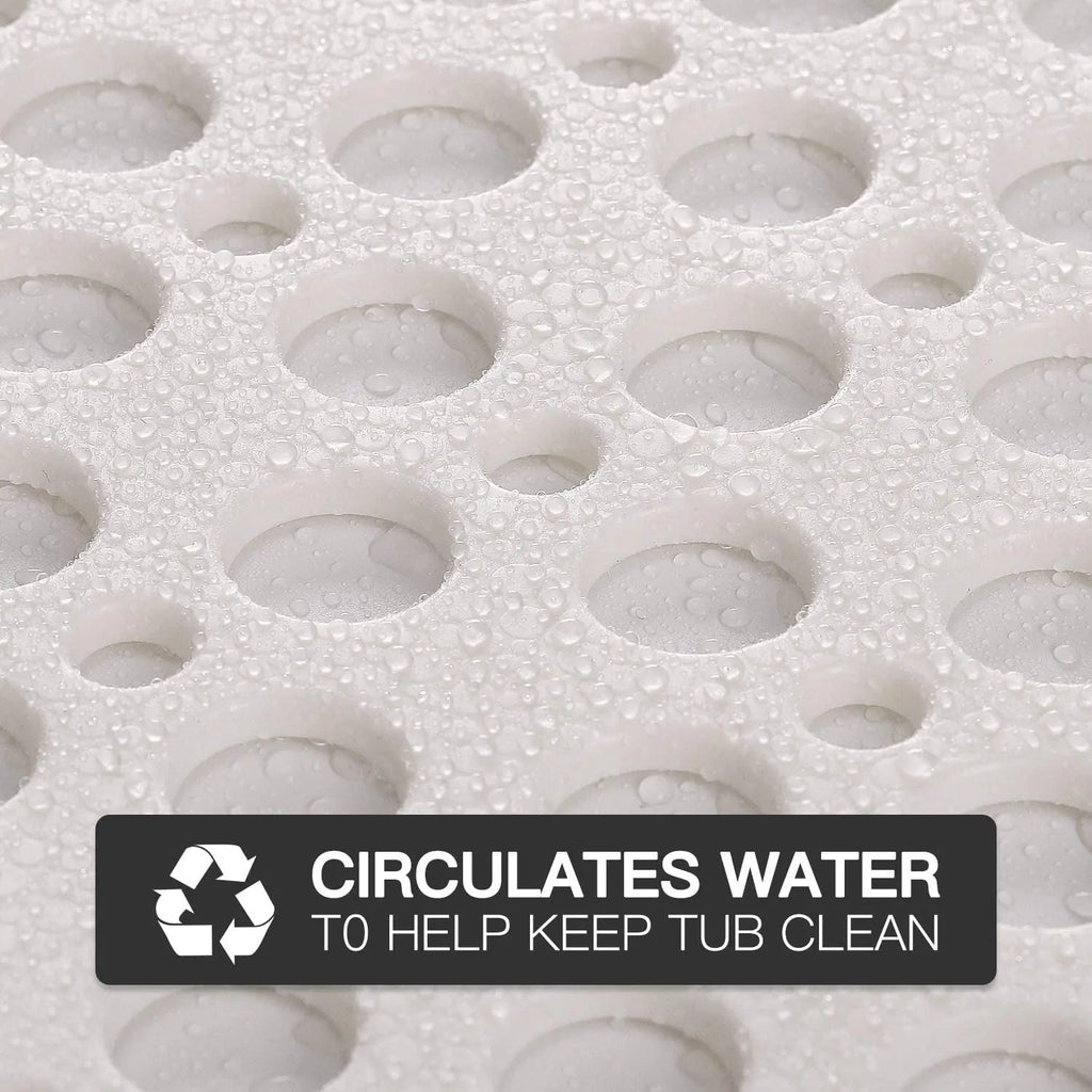 White shower bath mat with drainage holes designed to allow water circulation