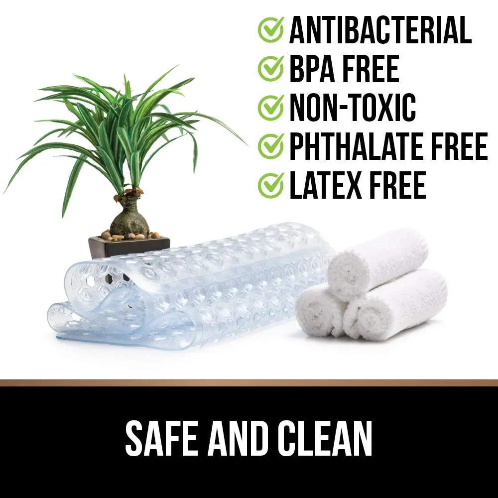 Transparent non-slip bath mat with soft flexible surface for bathroom and shower use