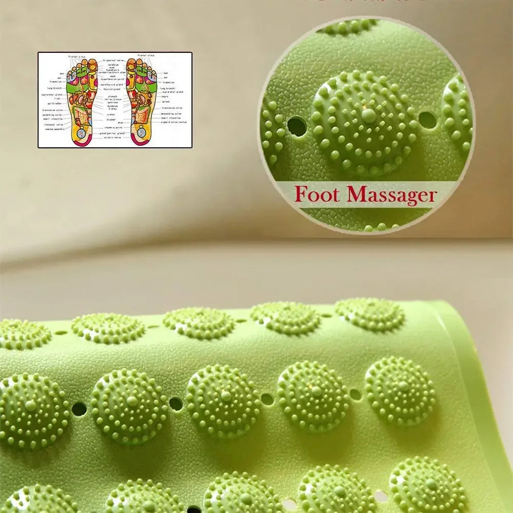 Close-up of LifeKrafts green Accu-Pebble bath mat with textured foot massager surface